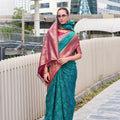 Elegant Teal Patola Print Silk Saree with Rich Maroon Zari Border
