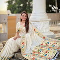 Off White Floral Woven Linen Silk Saree with Designer Peacock Border