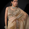 Golden Shimmer Silk Saree with Heavy Stone Zari Embroidered Border