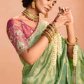 Pastel Green Soft Silk Saree with Woven Butti Designer Blouse
