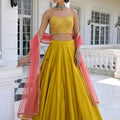 Stunning Mustard Yellow Silk Designer Lehenga Choli with Embroidery Work and Pink Dupatta