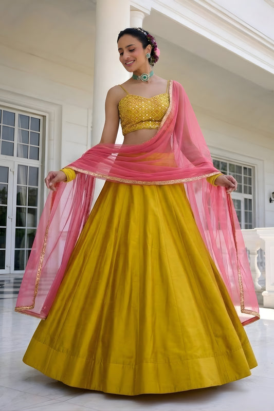 Stunning Mustard Yellow Silk Designer Lehenga Choli with Embroidery Work and Pink Dupatta