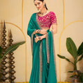 Teal Green Georgette Saree with Heavy Embroidered Magenta Blouse