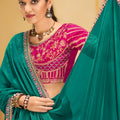 Teal Green Georgette Saree with Heavy Embroidered Magenta Blouse