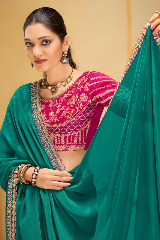 Teal Green Georgette Saree with Heavy Embroidered Magenta Blouse