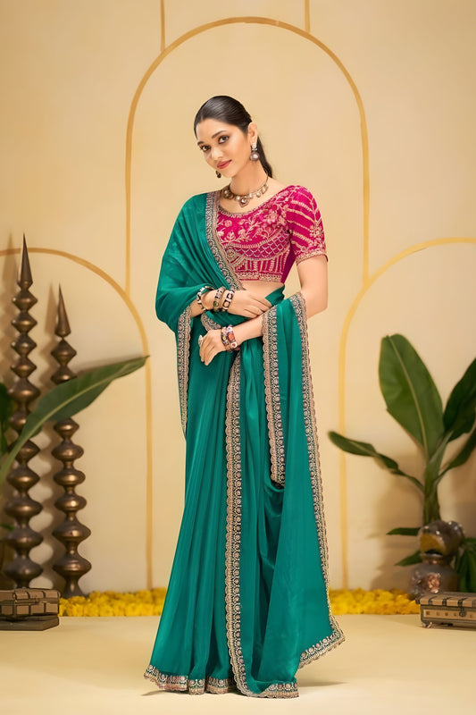 Teal Green Georgette Saree with Heavy Embroidered Magenta Blouse
