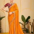 Mustard Yellow Georgette Saree with Heavy Embroidered Maroon Blouse