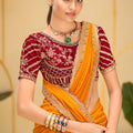 Mustard Yellow Georgette Saree with Heavy Embroidered Maroon Blouse