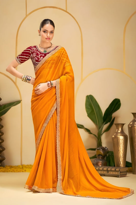 Mustard Yellow Georgette Saree with Heavy Embroidered Maroon Blouse