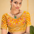 Purple Georgette Saree with Heavy Embroidered Yellow Blouse