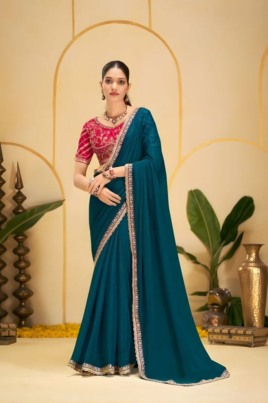 Teal Blue Georgette Saree with Heavy Embroidered Pink Blouse
