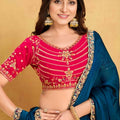 Teal Blue Georgette Saree with Red Embroidered Blouse