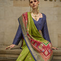 Traditional Green Banarasi Silk Saree with Red Pallu  Blue Blouse