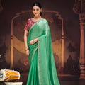 Sea Green Shimmer Silk Saree Embroidered Border Red Designer Blouse 