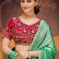 Sea Green Shimmer Silk Saree Embroidered Border Red Designer Blouse