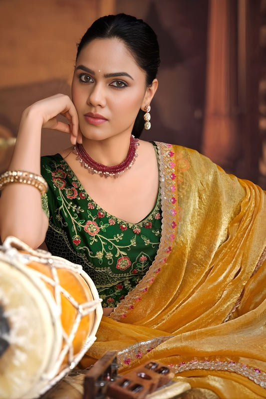 Mustard Yellow Organza Silk Saree Embellished Border Green Blouse