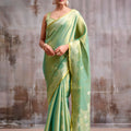 Graceful Pista Green Tissue Silk Zari Work Saree for Wedding