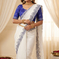 Off White Organza Saree with Blue Embroidered Border
