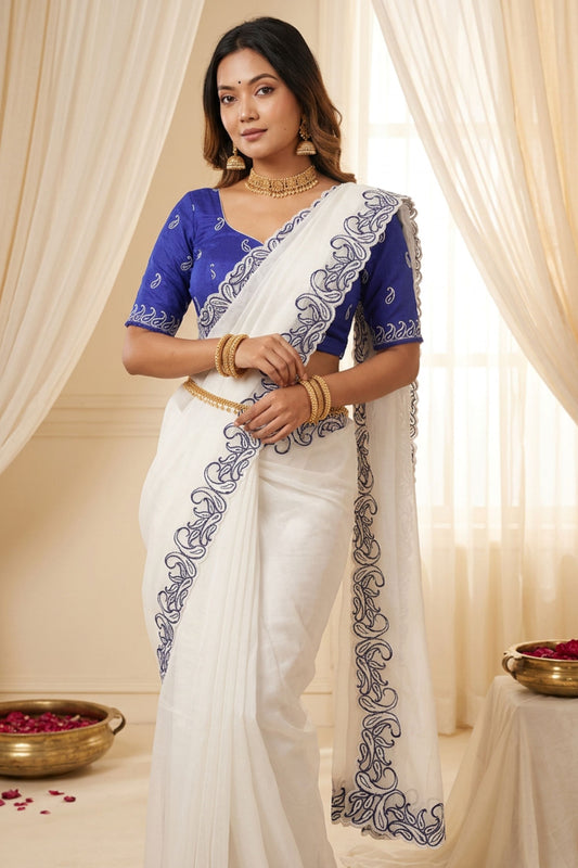 Off White Organza Saree with Blue Embroidered Border