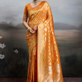 Luxury Orange Banarasi Silk Saree Rich Gold Zari Weaving Traditional Motifs