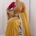 Mustard Yellow Tissue Silk Saree with Heavy Floral Embroidered Border