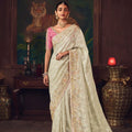 Off-White Silk Saree with Heavy Border Contrast Pink Blouse