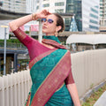 Elegant Teal Patola Print Silk Saree with Rich Maroon Zari Border