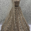 Royal Golden Net Bridal Lehenga Choli with Heavy Sequins and Thread Embroidery