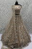 Royal Golden Net Bridal Lehenga Choli with Heavy Sequins and Thread Embroidery