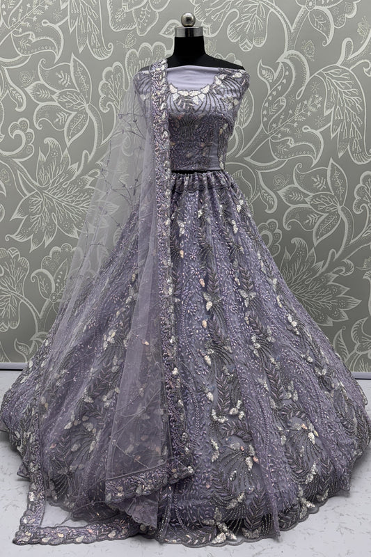 Elegant Lavender Net Bridal Lehenga Choli with Heavy Sequins and Thread Embroidery