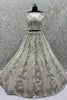 Radiant Off-White Net Bridal Lehenga Choli with Heavy Silver Sequins and Thread Embroidery