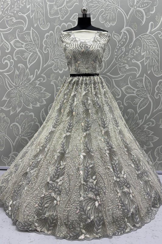 Radiant Off-White Net Bridal Lehenga Choli with Heavy Silver Sequins and Thread Embroidery