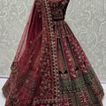 Fabulous Maroon Velvet Bridal Lehenga Choli with Heavy Mirror and Zari Embroidery Work