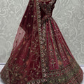 Designer Maroon Velvet Bridal Lehenga Choli with Heavy Mirror and Zari Embroidery Work