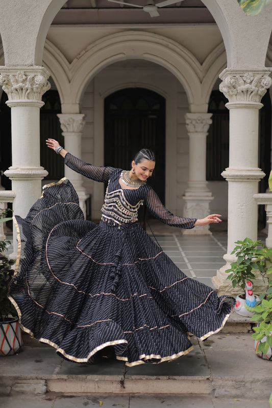 Stylish Black Bandhani Print Faux Georgette Lehenga Choli with Mirror Work