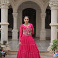 Vibrant Rani Pink Bandhani Print Faux Georgette Lehenga Choli with Mirror Work