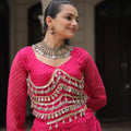 Vibrant Rani Pink Bandhani Print Faux Georgette Lehenga Choli with Mirror Work
