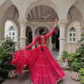 Vibrant Rani Pink Bandhani Print Faux Georgette Lehenga Choli with Mirror Work