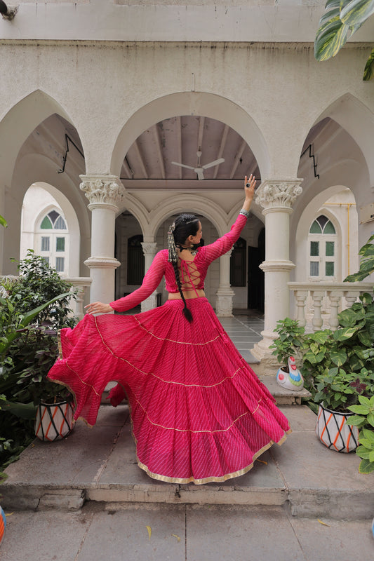 Vibrant Rani Pink Bandhani Print Faux Georgette Lehenga Choli with Mirror Work
