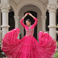 Vibrant Rani Pink Bandhani Print Faux Georgette Lehenga Choli with Mirror Work