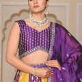 Impressive Purple and Yellow Embroidered Silk Lehenga Choli with Dupatta for Festive Occasion
