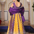 Impressive Purple and Yellow Embroidered Silk Lehenga Choli with Dupatta for Festive Occasion