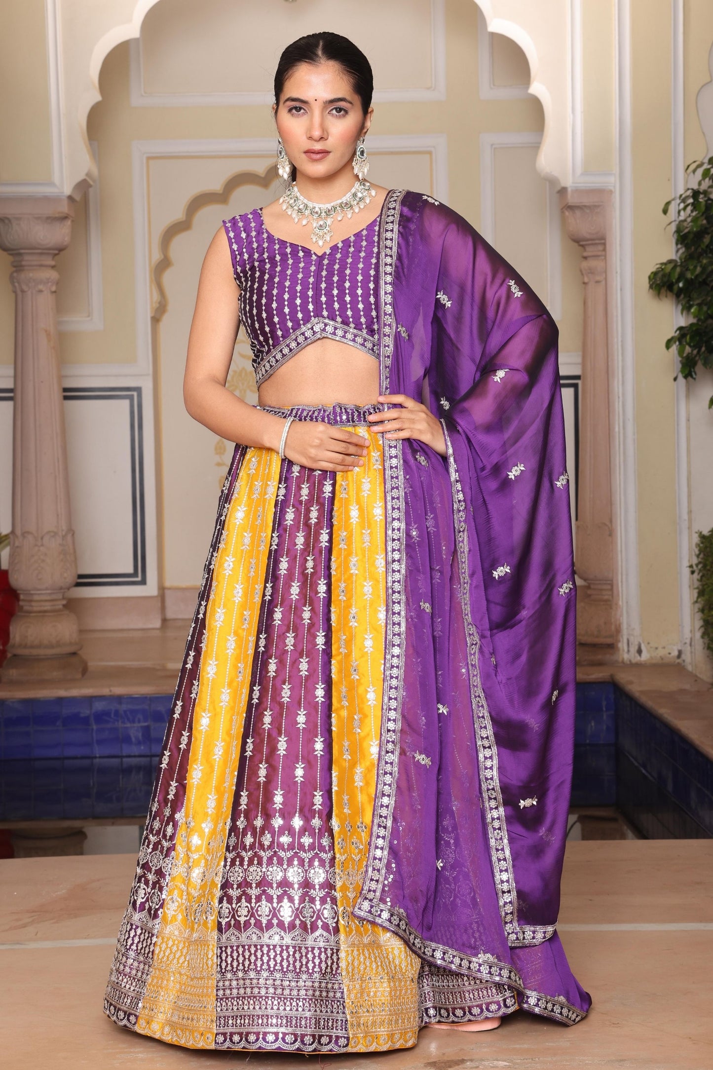 Impressive Purple and Yellow Embroidered Silk Lehenga Choli with Dupatta for Festive Occasion