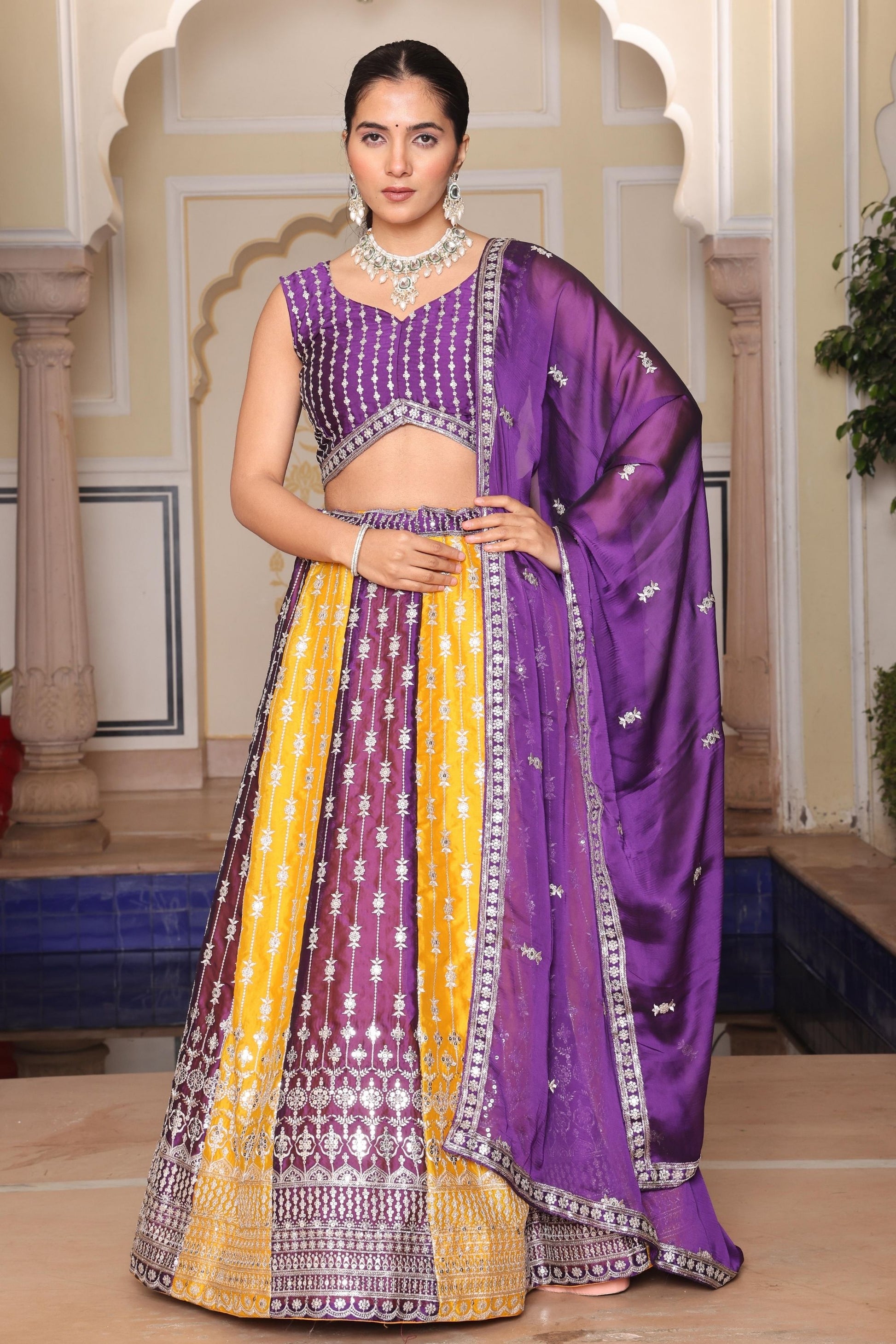 Impressive Purple and Yellow Embroidered Silk Lehenga Choli with Dupatta for Festive Occasion