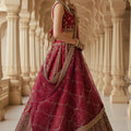 Majestic Red Gadhwal Silk Embroidered Bridal Lehenga Choli with Zari Work and Net Dupatta