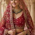 Majestic Red Gadhwal Silk Embroidered Bridal Lehenga Choli with Zari Work and Net Dupatta