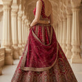 Majestic Red Gadhwal Silk Embroidered Bridal Lehenga Choli with Zari Work and Net Dupatta