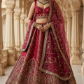 Majestic Red Silk Embroidered Bridal Lehenga Choli with Heavy Zari Work and Net Dupatta