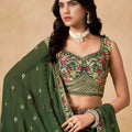 Stylish Dark Green Georgette Lehenga Choli with Floral Zari Embroidery and Matching Dupatta for Wedding