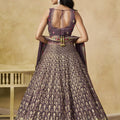 Trendy Purple Georgette Lehenga Choli with Floral Zari Embroidery and Matching Dupatta for Wedding